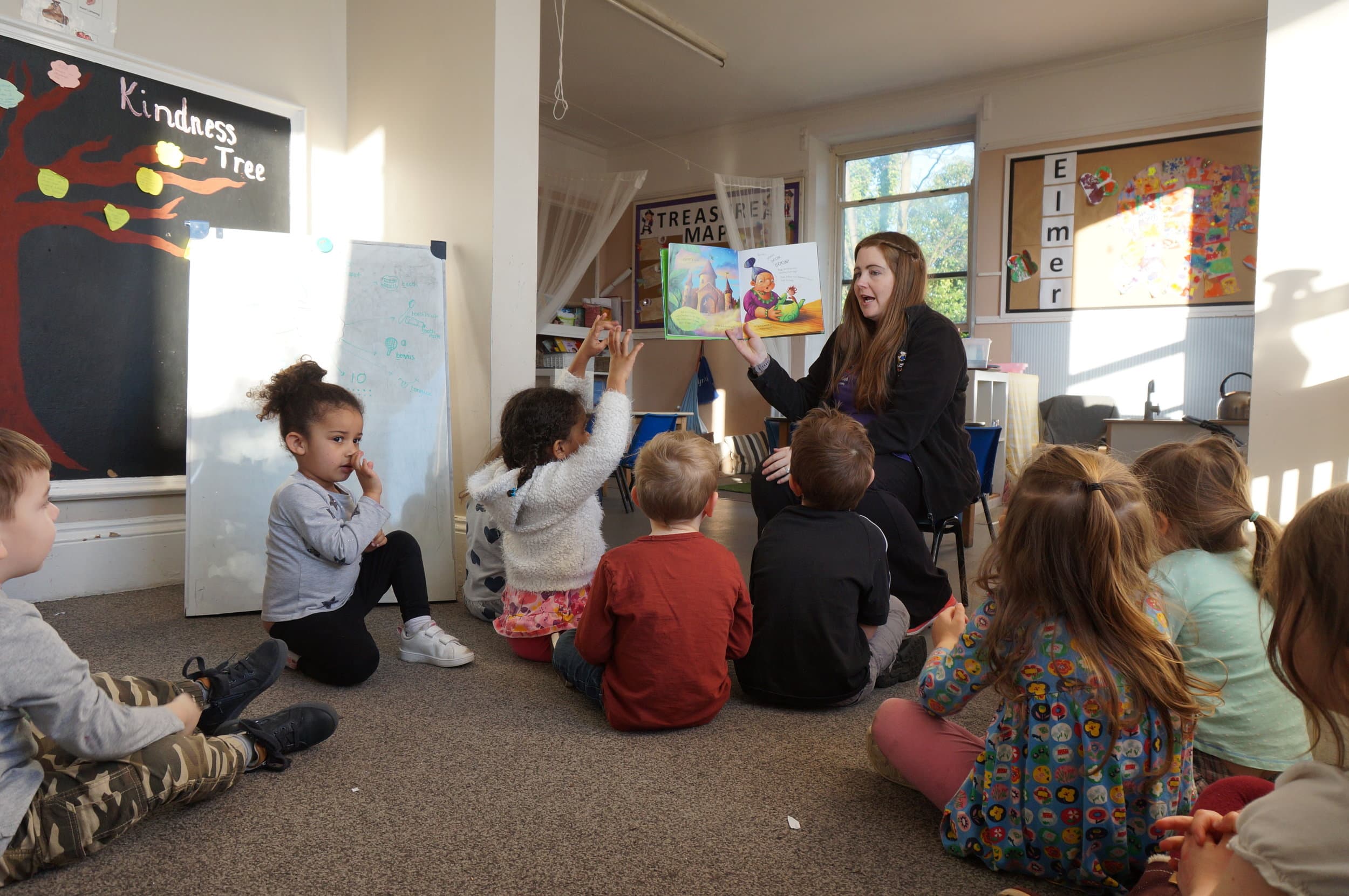 Toddlers exploring toys at Macclesfield Day Nursery